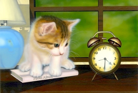子猫の絵：ねこと時計